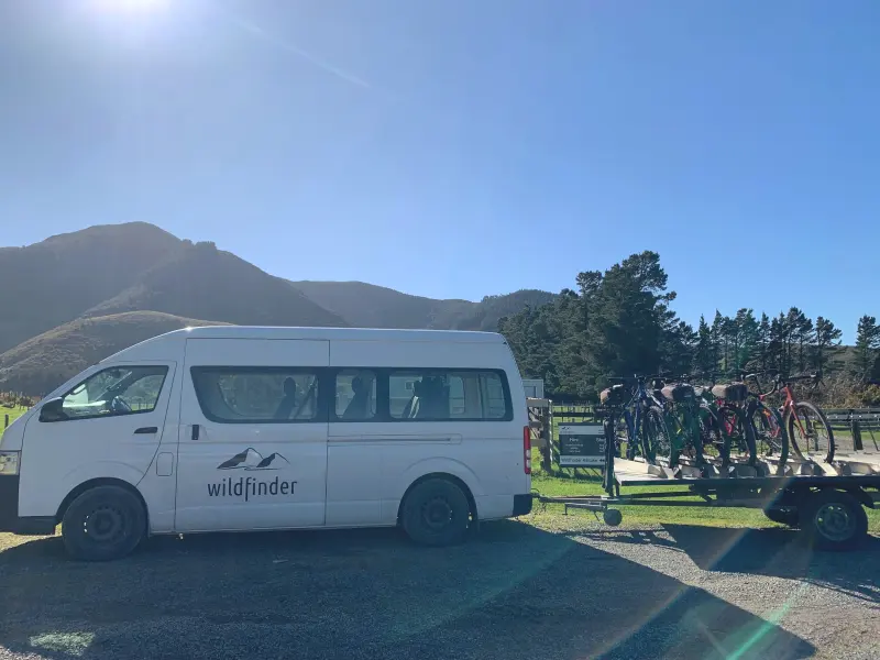 Wildfinder shuttle van and bike trailer at the Kaitoke trailhead