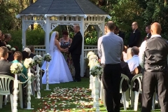 garden-wedding-ceremony-at-gazebo-medium
